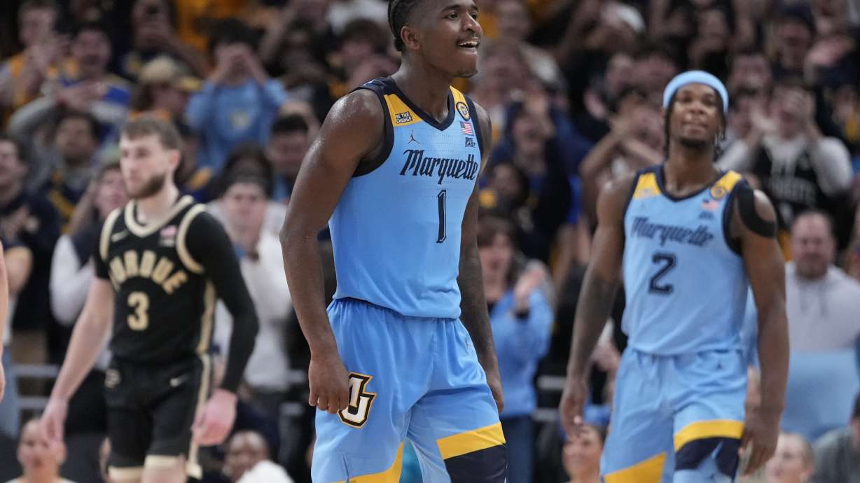 Marquette's Kam Jones reacts during the second half of an NCAA college basketball game against Purdue Tuesday, Nov. 19, 2024, in Milwaukee. Marquette won 76-58.
