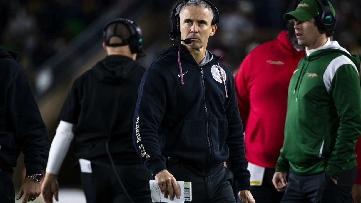 Florida State head coach Mike Norvell looks at the scoreboard during the second half of an NCAA college football game Saturday, Nov. 9, 2024, in South Bend, Ind.