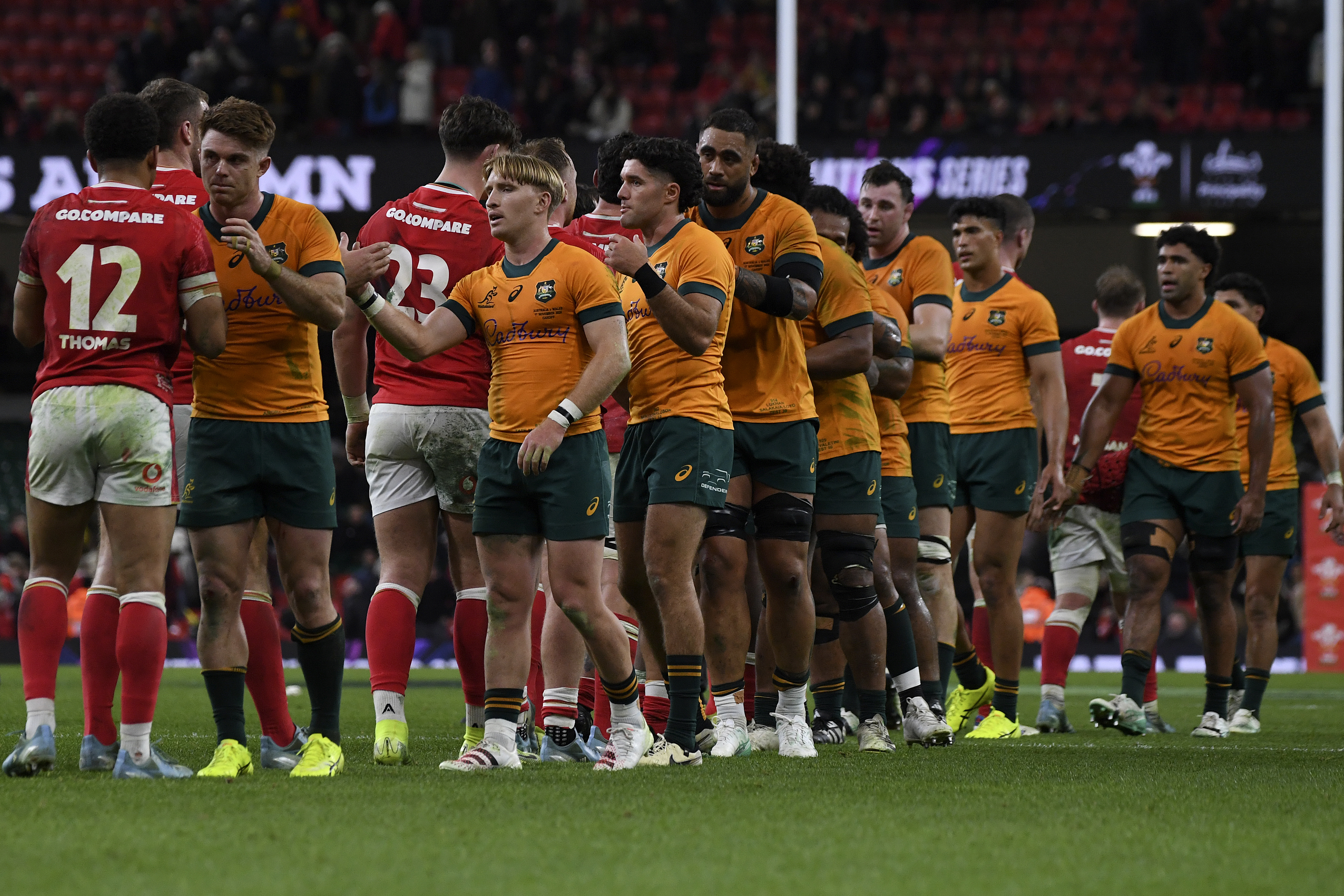 Australian players and Welsh players shake hands after Australia won the Autumn Nations series rugby union match between Wales and Australia at the Principality Stadium in Cardiff, Wales, Sunday, Nov. 17, 2024.