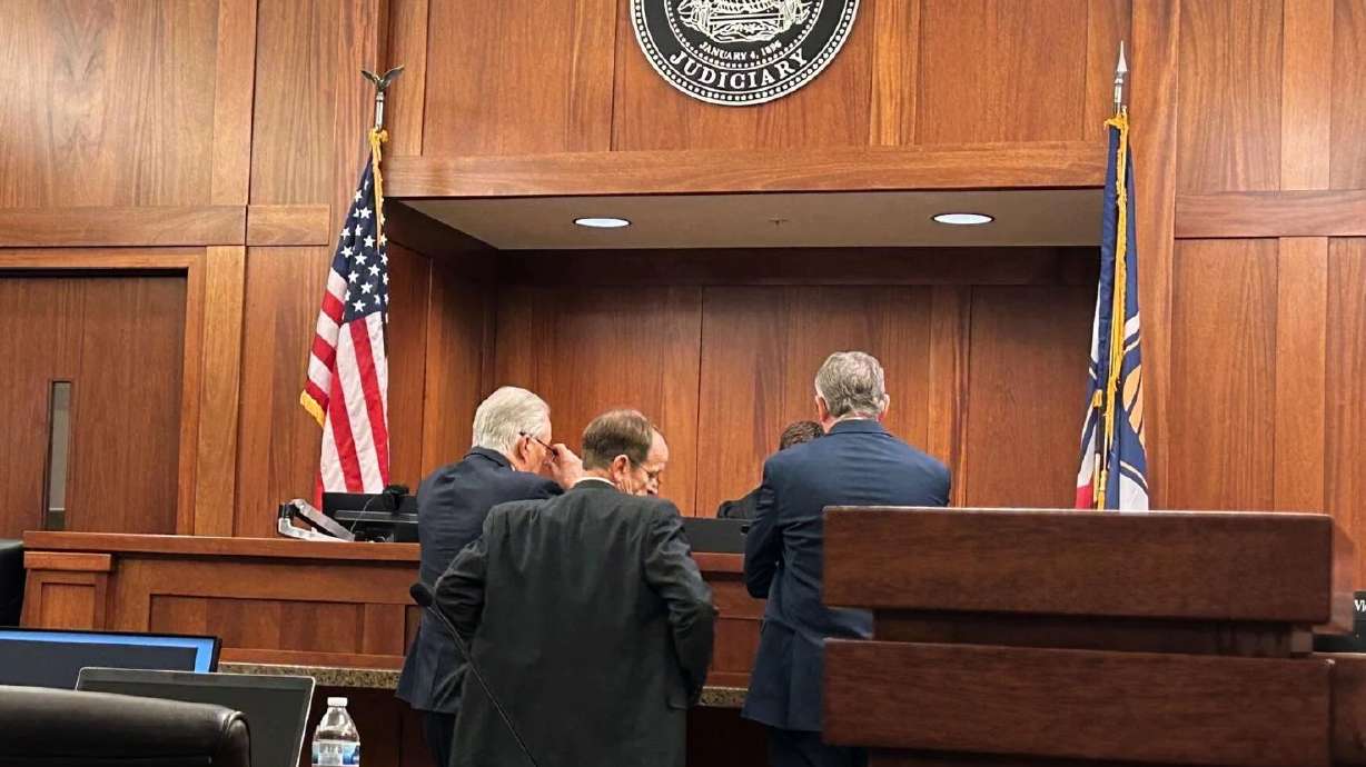 Attorneys take a side bar to consult with the judge in the trial of Randy Lessing, accused in the death of a 2-year-old, during a hearing held in 5th District Court in St. George on Monday.