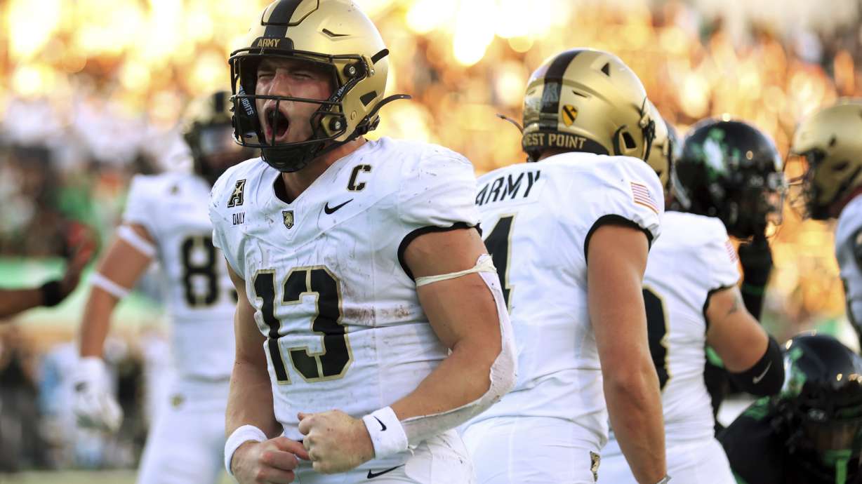 Army quarterback Bryson Daily (13) celebrates after a touchdown against North Texas in the second half of an NCAA football game Saturday, Nov. 9, 2024, in Denton, TX.