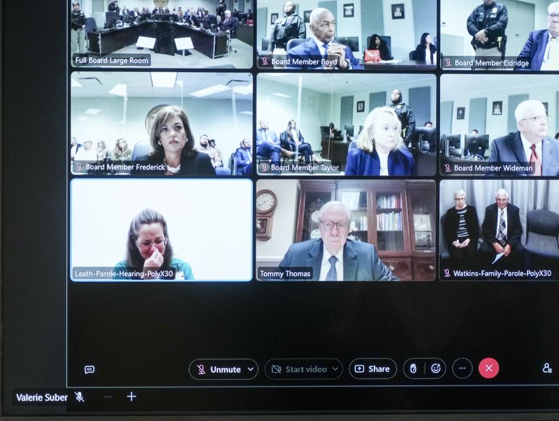 Susan Smith, lower left on video screen, breaks down as she addresses the parole board during a parole hearing for convicted murderer Susan Smith in Columbia, South Carolina, Wednesday.