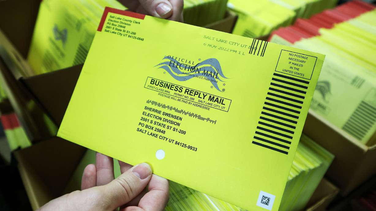 A ballot is looked over at the Salt Lake County Clerk’s ballot processing room on Election Day in Salt Lake City on Nov. 8, 2022. Utah Sen. John Curtis said he supports federal legislation requiring proof of ID and citizenship to vote, but said it's likely too late to implement the SAVE America Act if it's passed before the midterms.
