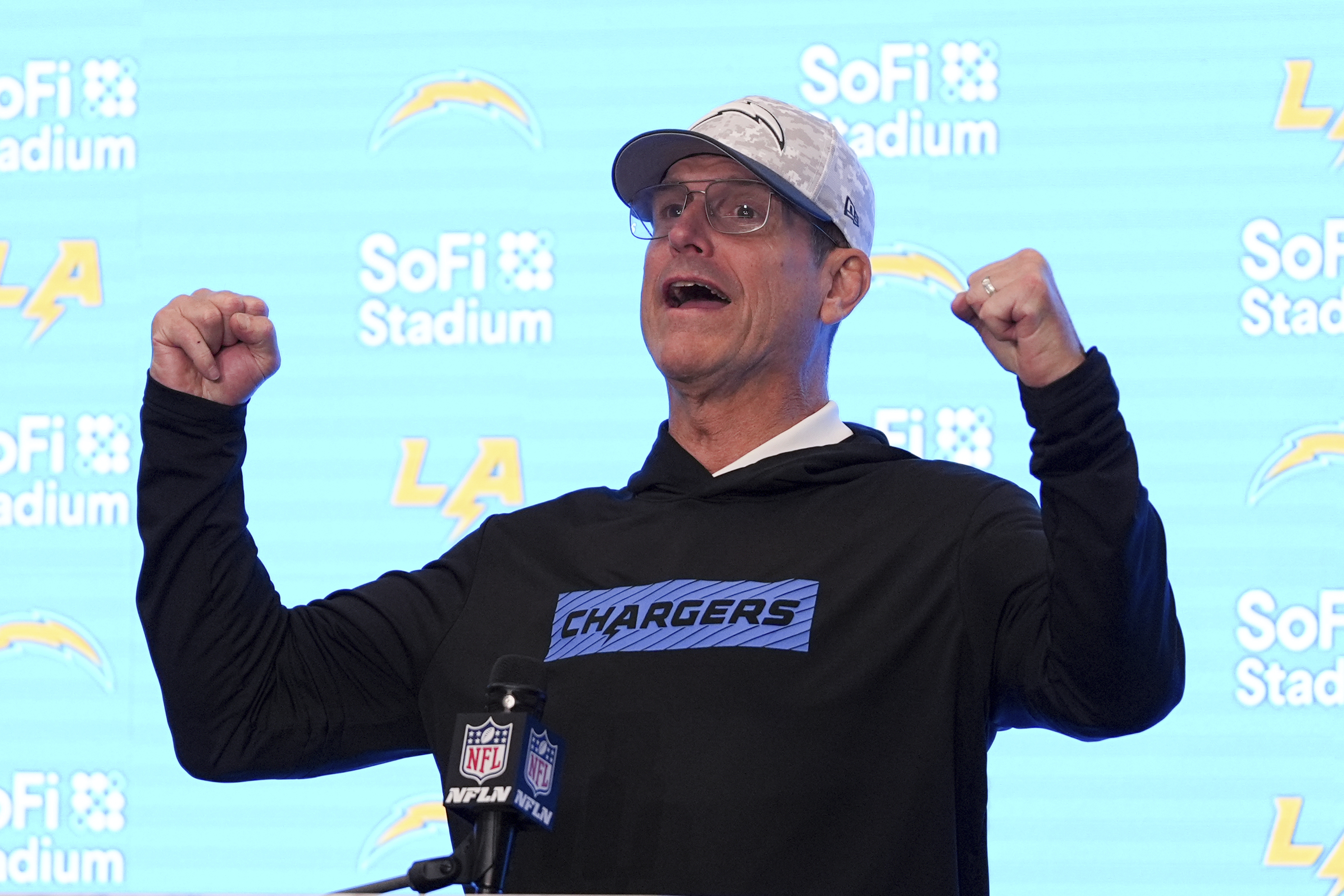 Los Angeles Chargers head coach Jim Harbaugh answers questions after a win over the Cincinnati Bengals in an NFL football game Sunday, Nov. 17, 2024, in Inglewood, Calif.