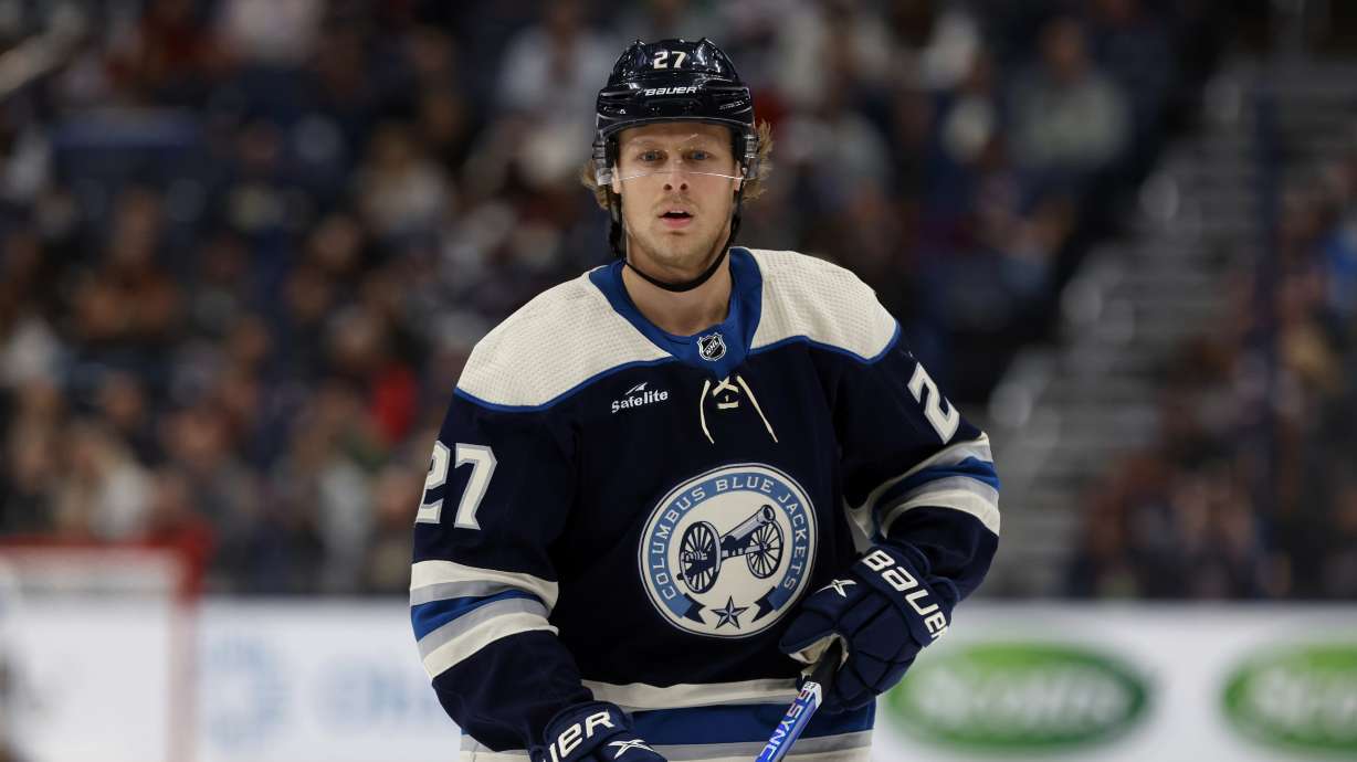 FILE - Columbus Blue Jackets defenseman Adam Boqvist (27) is seen against the St. Louis Blues during an NHL hockey game in Columbus, Ohio, March 11, 2023.