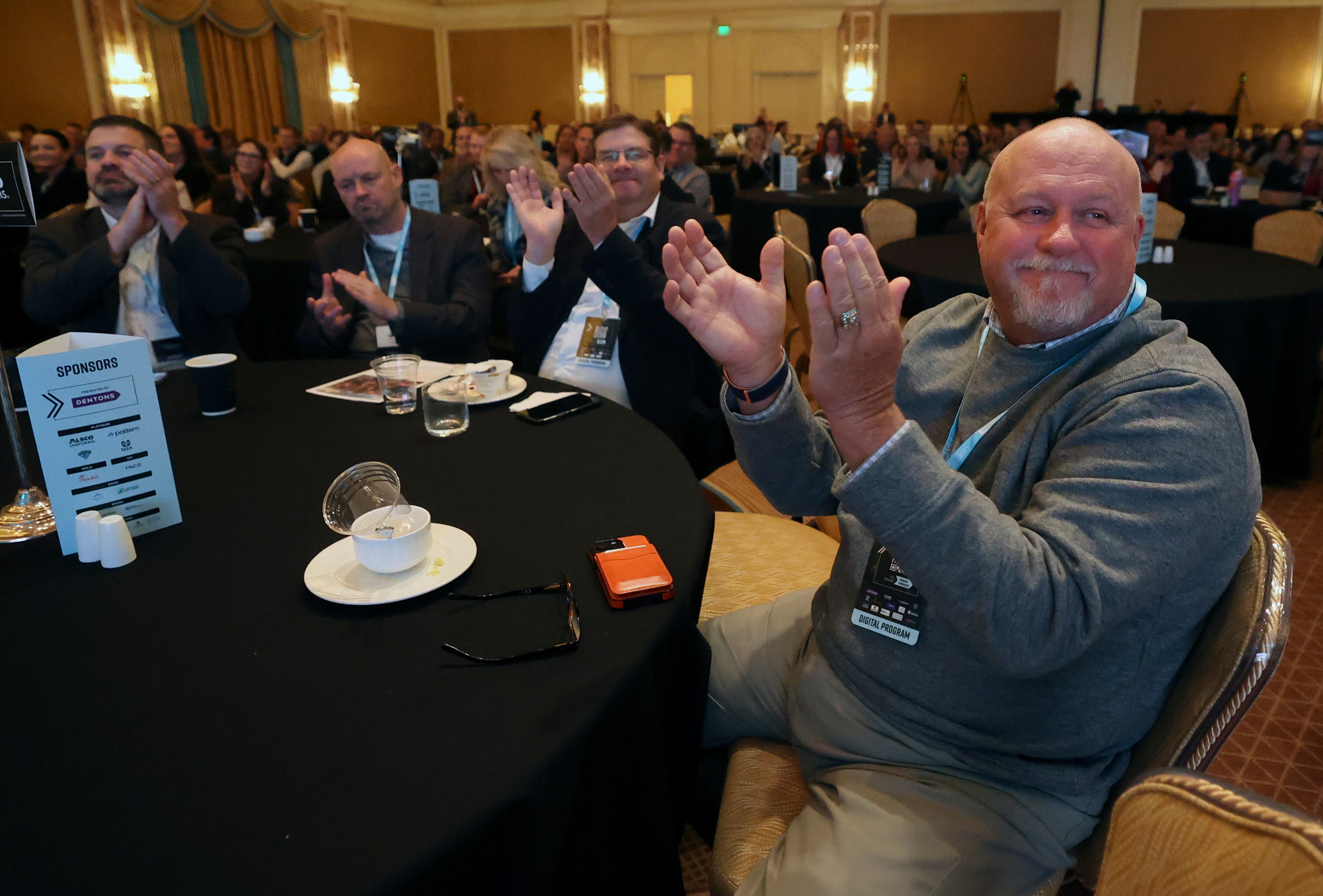 People applaud a speaker at the Utah Business Forward event at The Grand America Hotel in Salt Lake City on Wednesday.