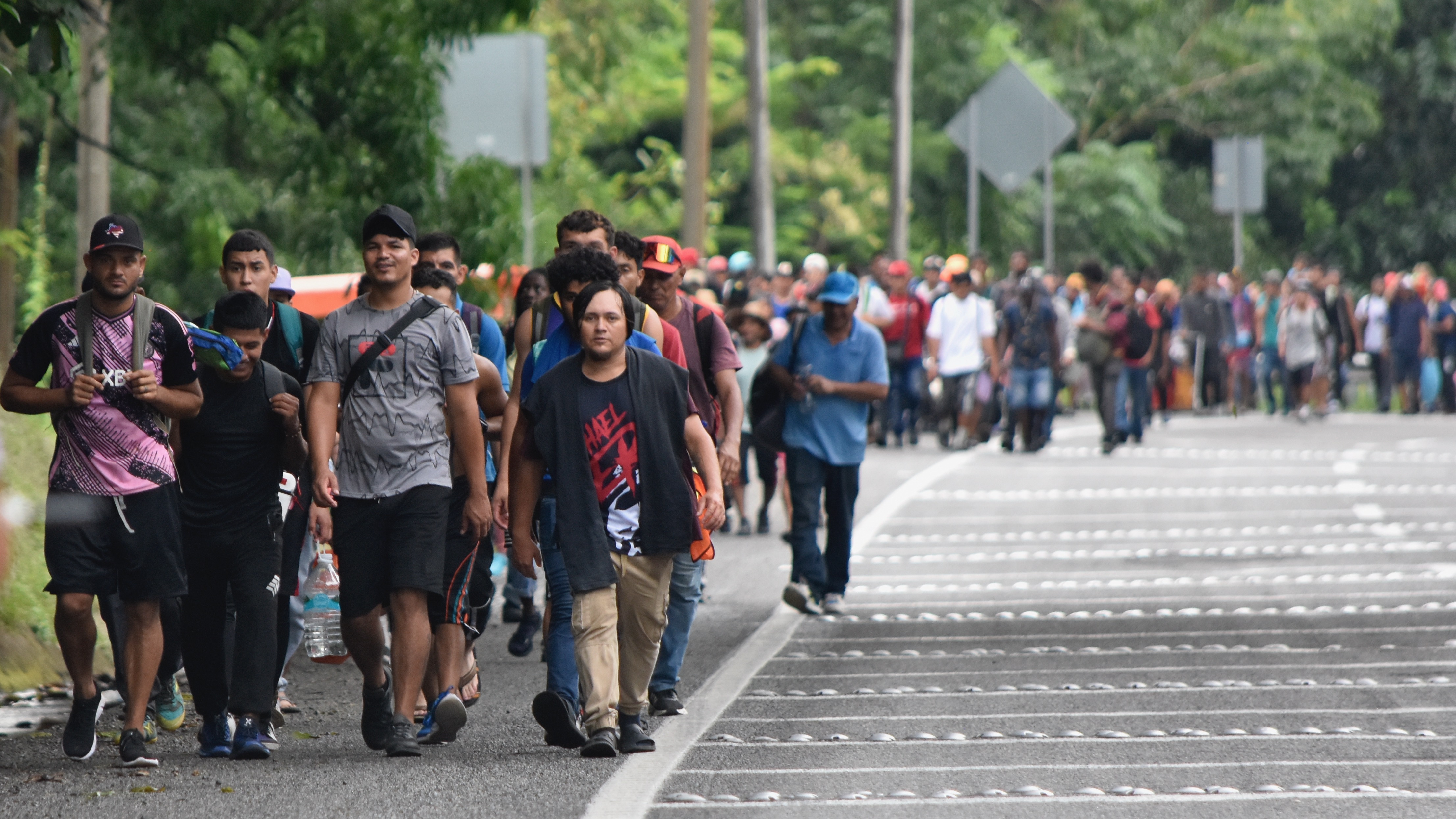 Migrants walk through Tapachula, Chiapas state, in Mexico, on Wednesday, hoping to reach the U.S. border. Data released Tuesday shows a dip in U.S.-Mexico border activity.