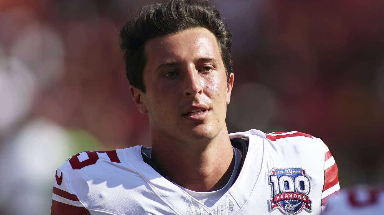 New York Giants quarterback Tommy DeVito (15) in action after an NFL football game against the Washington Commanders, Sept. 15, 2024 in Landover, Md.