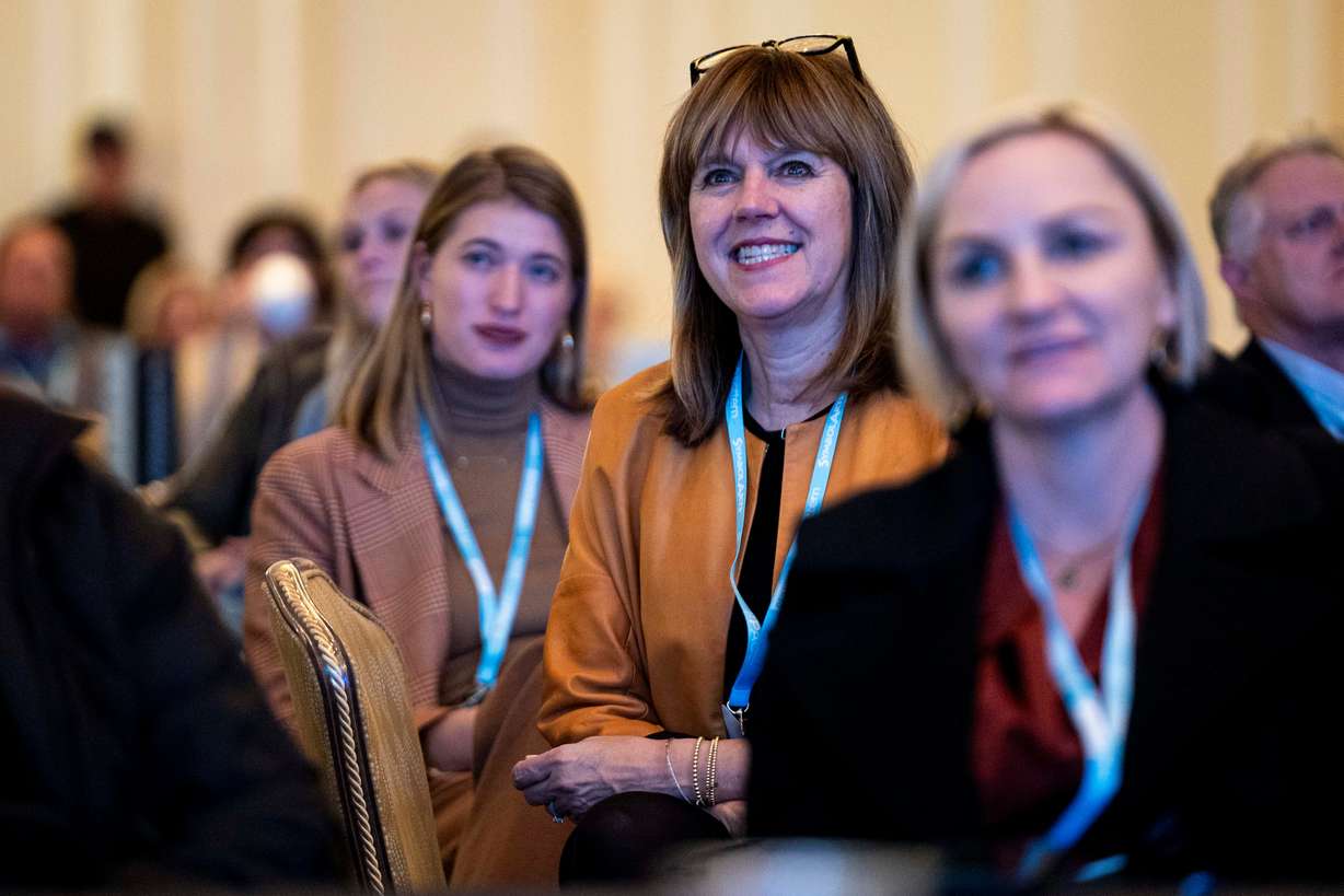 An attendee listens as Hannah and Daniel Neeleman, co-founders of Ballerina Farm, speak during Utah Business Forward 2024 held at The Grand America Hotel in Salt Lake City on Nov. 20.