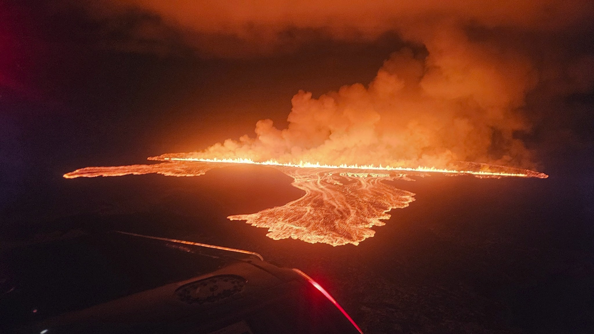 This photograph shows a new volcanic eruption that started on the Reykjanes Peninsula in Iceland, Wednesday.