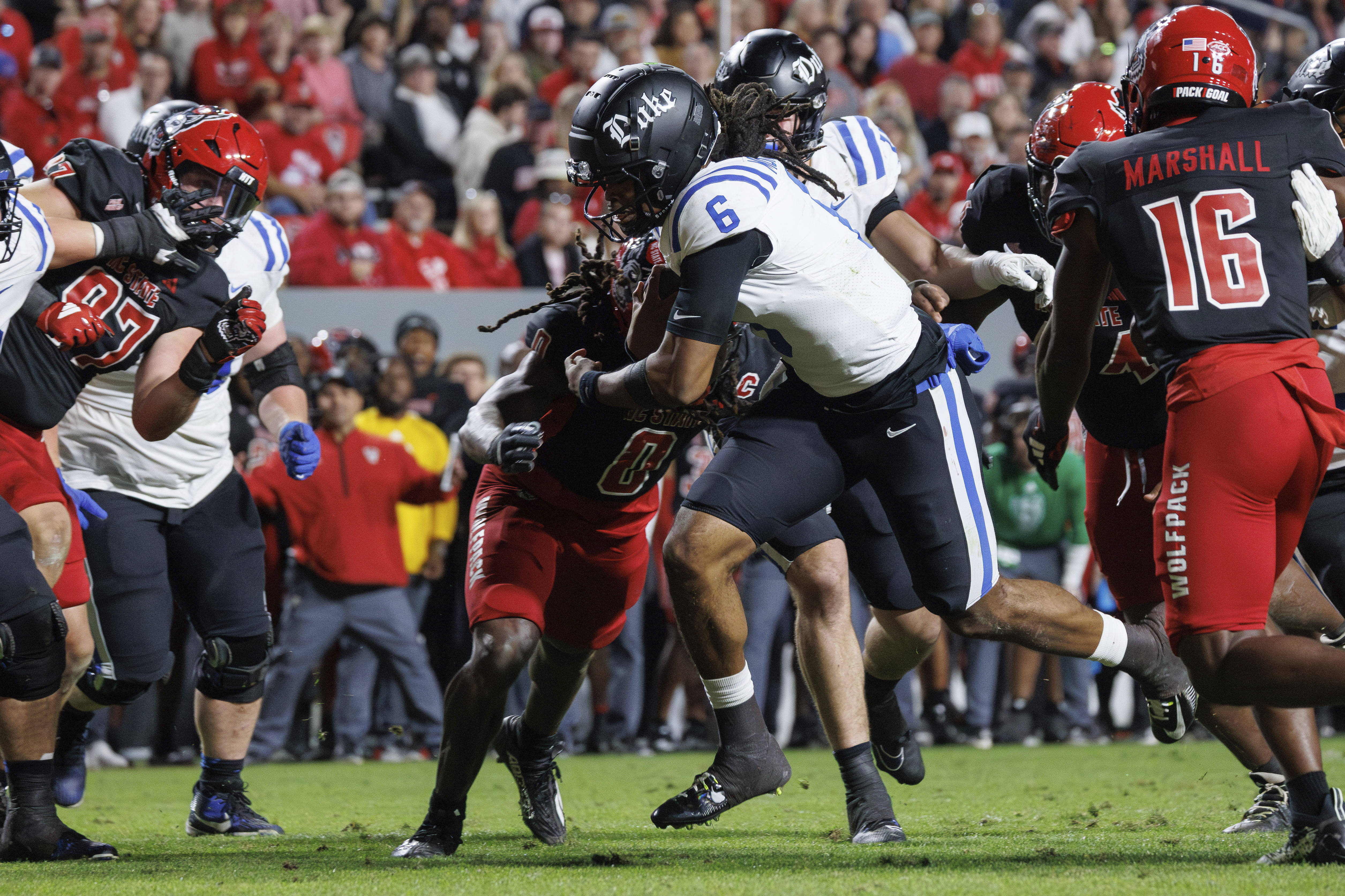 Duke quarterback Maalik Murphy (6) carries the ball for a touchdown during the second half of an NCAA college football game against North Carolina State in Raleigh, N.C., Saturday, Nov. 9, 2024.