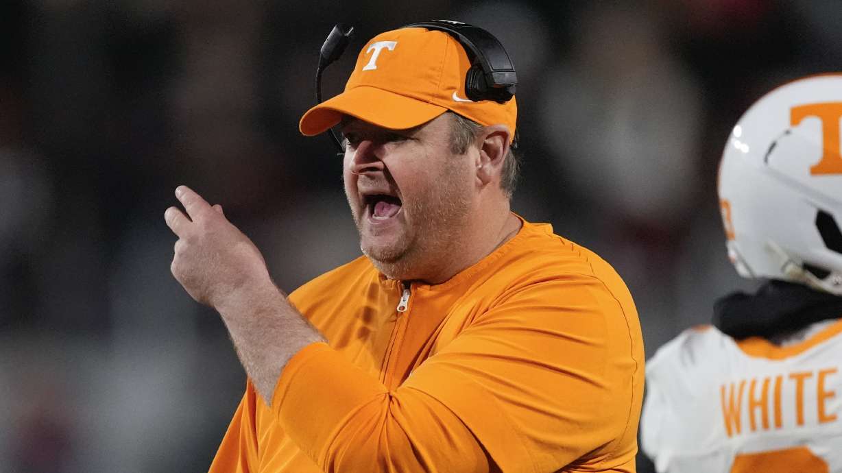 Tennessee head coach Josh Heupel yells to an official during the first half of an NCAA college football game against Georgia , Saturday, Nov. 16, 2024, in Athens, Ga.
