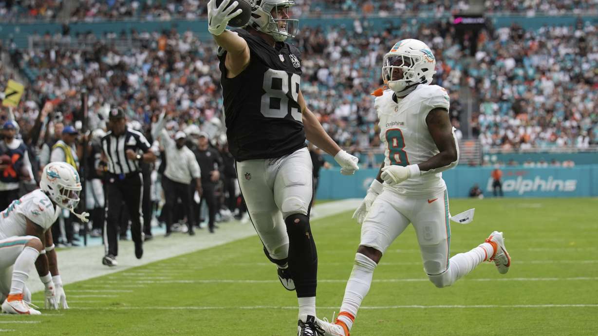 Las Vegas Raiders tight end Brock Bowers (89) scores a touchdown during the second half of an NFL football game against the Miami Dolphins, Sunday, Nov. 17, 2024, in Miami Gardens, Fla.