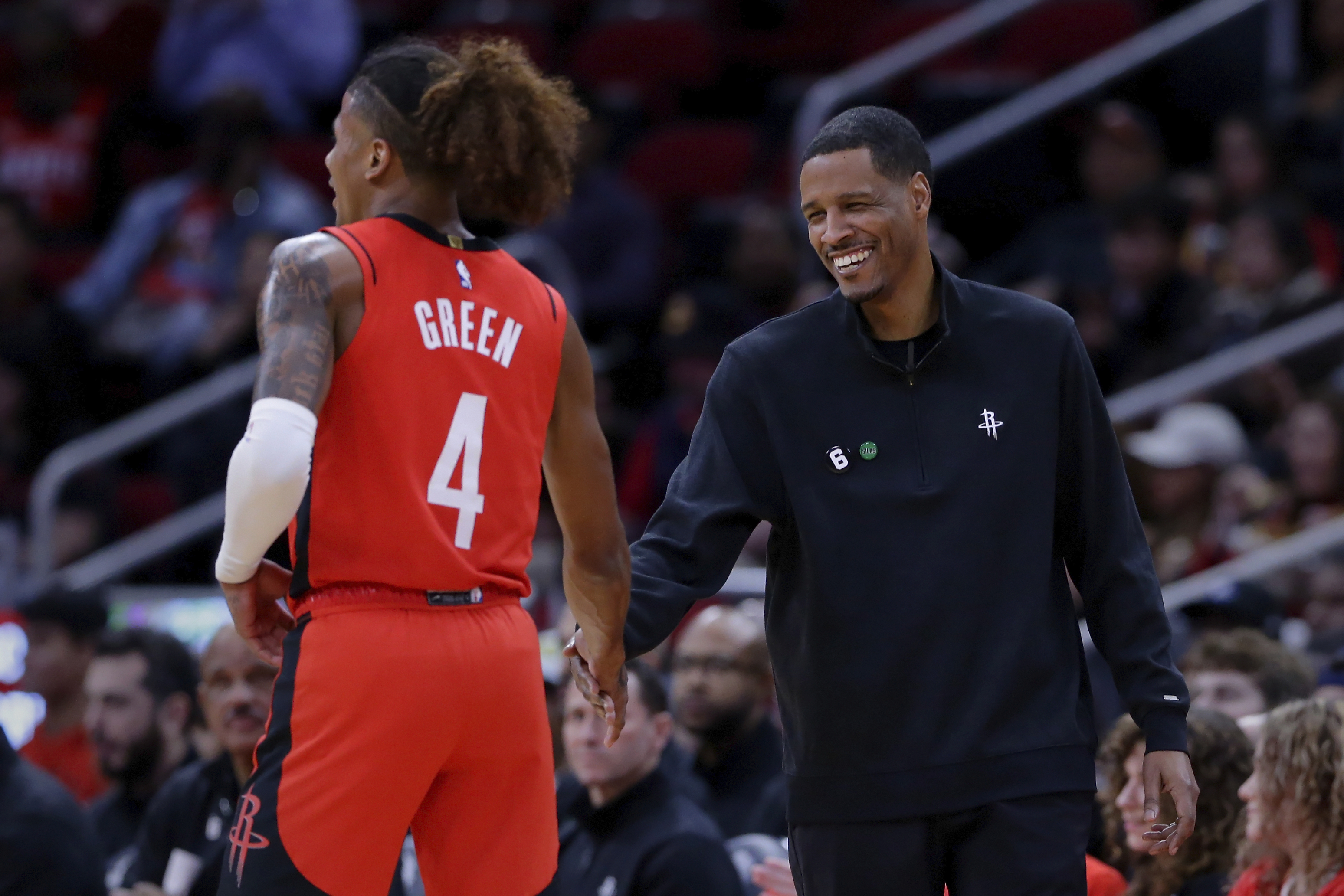 FILE - Houston Rockets guard Jalen Green (4) and head coach Stephen Silas shake hands after a score and a foul by Green against the New York Knicks during the first half of an NBA basketball game Saturday, Dec. 31, 2022, in Houston.