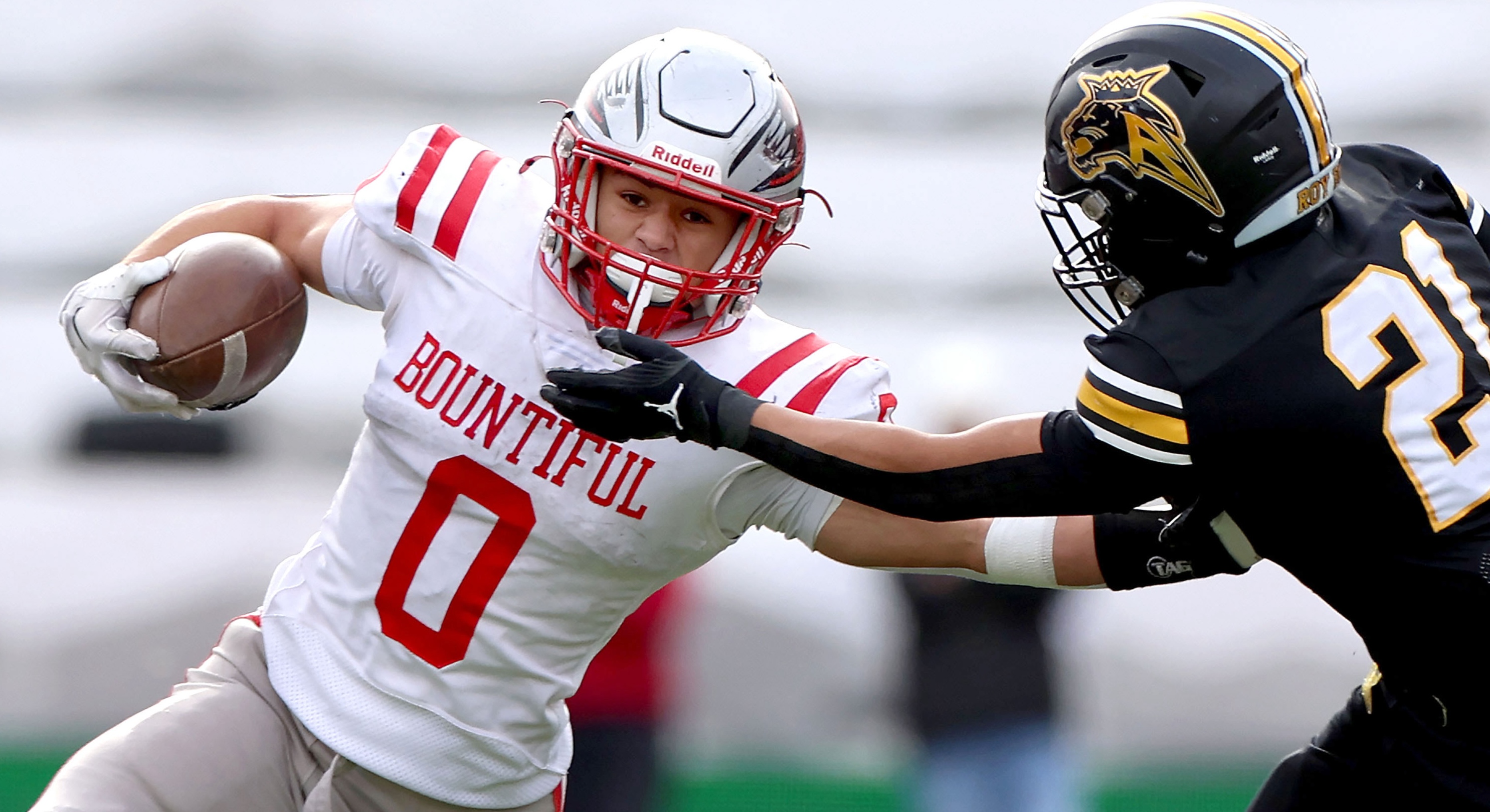 Bountiful’s Siaki Fekitoa pushes away Roy’s Kahekili Eleneke in the 5A championship at Rice-Eccles Stadium in Salt Lake City on Thursday, Nov. 21, 2024.