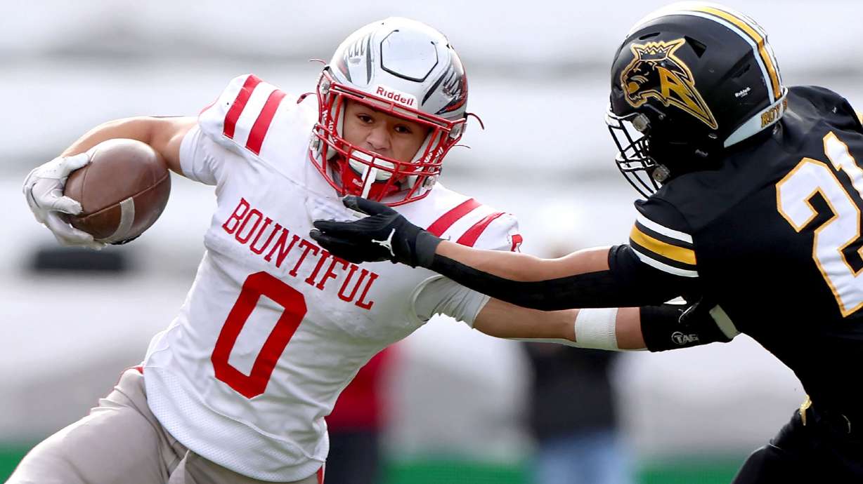 Bountiful’s Siaki Fekitoa pushes away Roy’s Kahekili Eleneke in the 5A championship at Rice-Eccles Stadium in Salt Lake City on Thursday, Nov. 21, 2024.