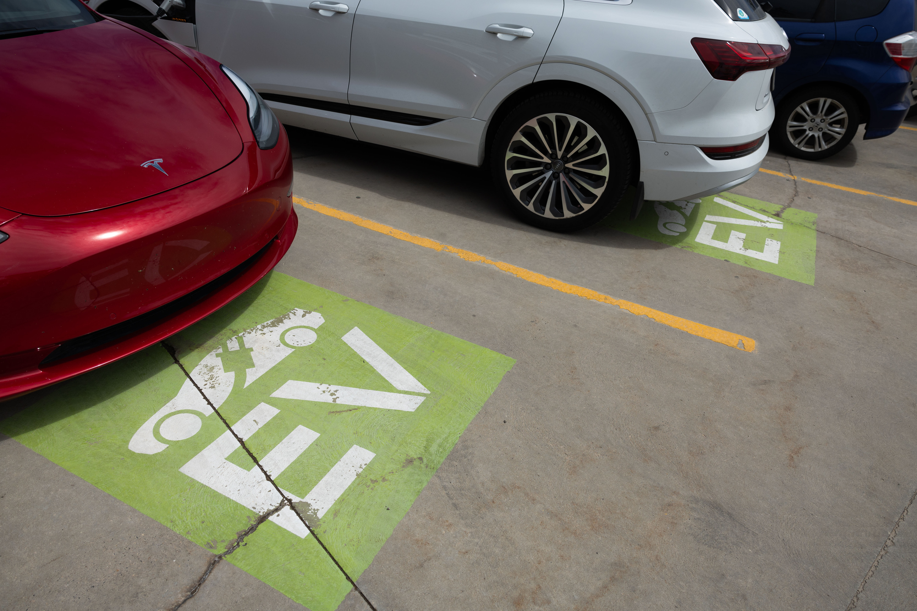 Parking spots are marked for electric charging stations outside of the Utah State Capitol in Salt Lake City on May 2. New AAA data released Thursday shows the state currently has some of the lowest electric vehicle recharging prices in the nation.