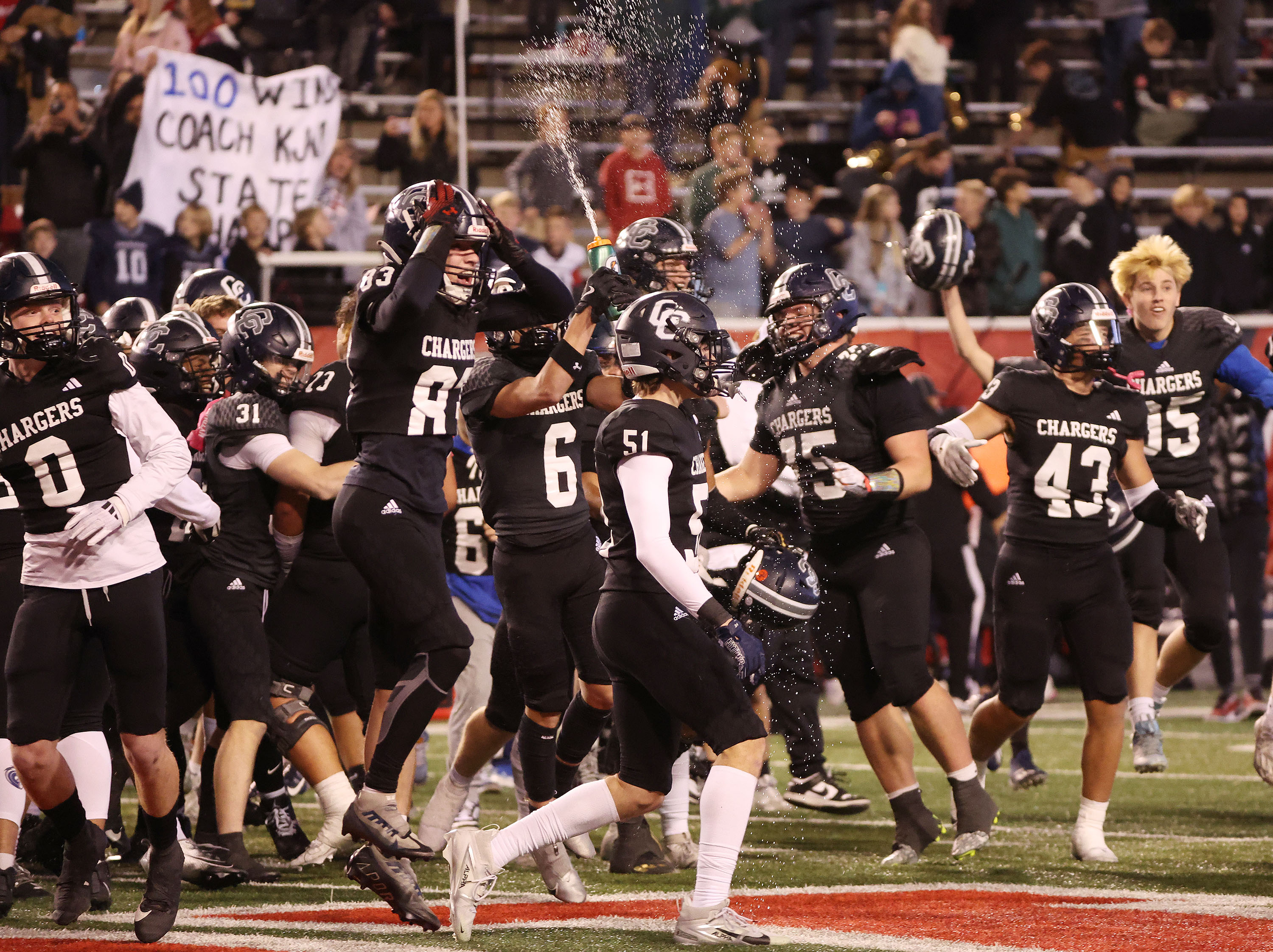 Corner Canyon celebrate win over Lone Peak in the 6A state championship at Rice-Eccles stadium in Salt Lake City on Thursday, Nov. 21, 2024.