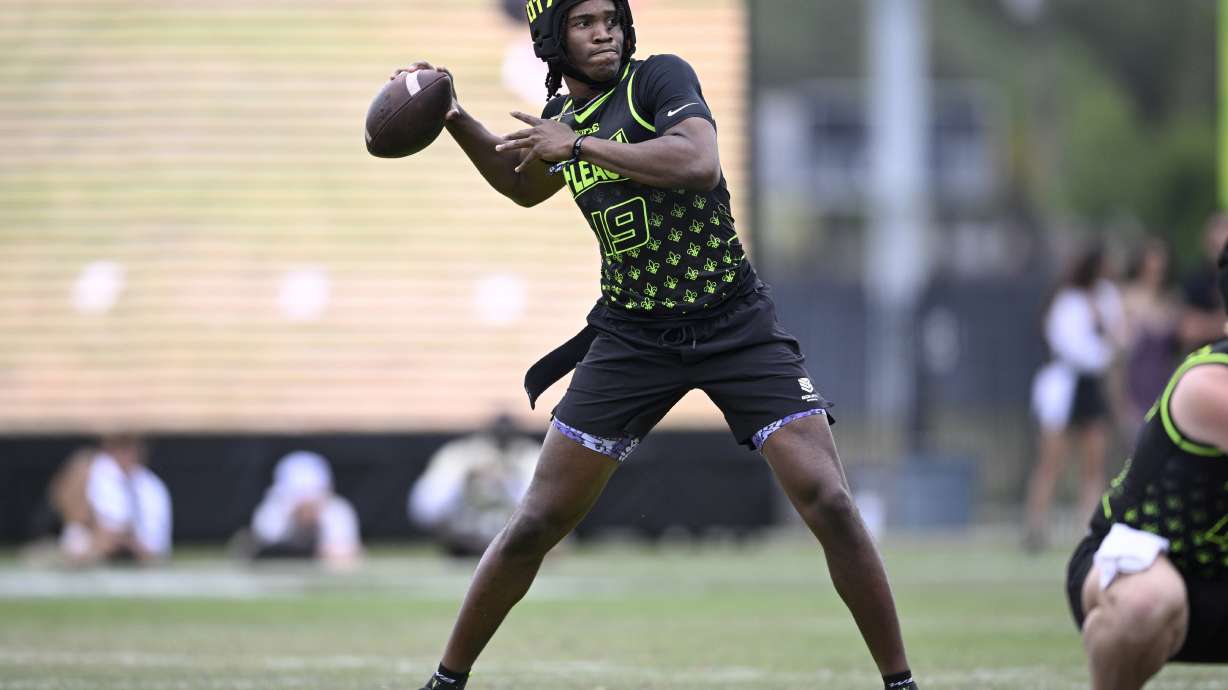 FILE - Fleaux quarterback Bryce Underwood (19) during the OT7 Orlando football tournament against Raw, April 27, 2024, in Orlando, Fla.