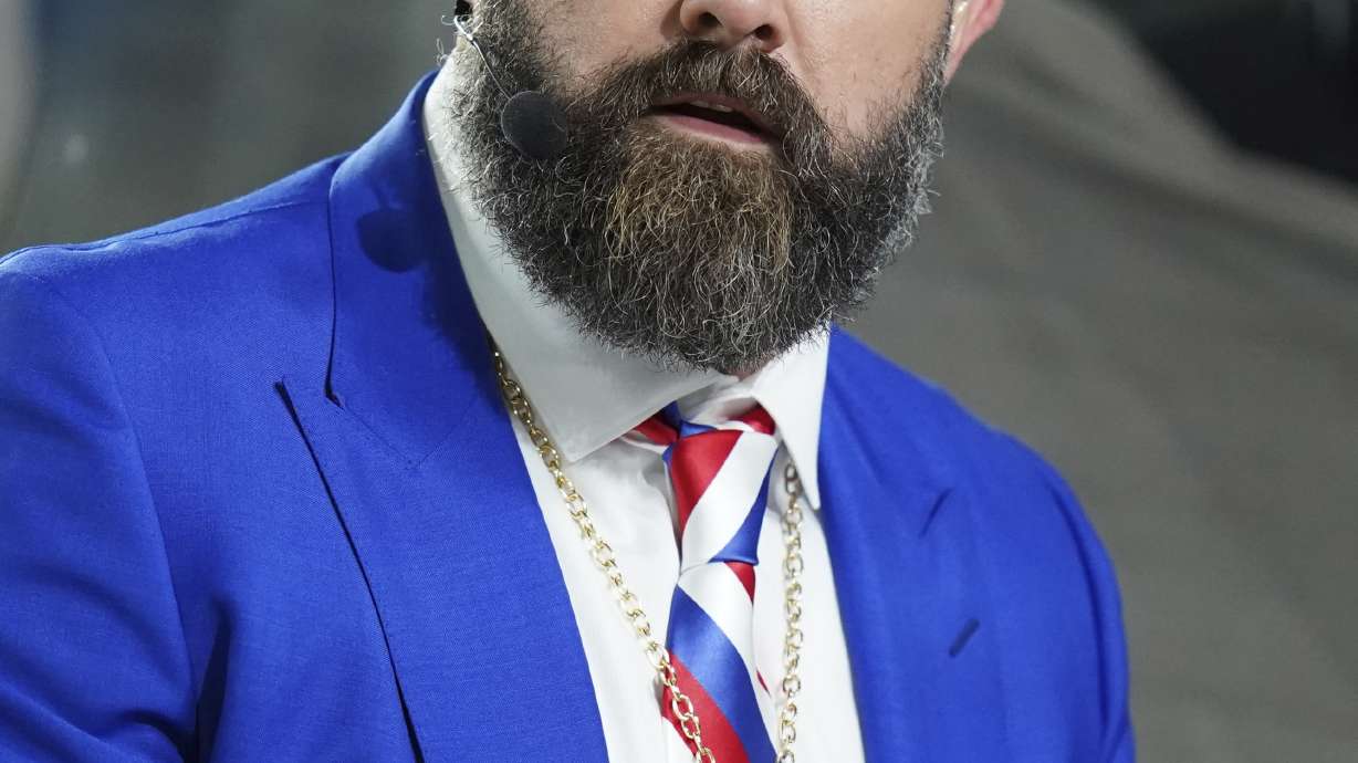 FILE - Former Philadelphia Eagles center Jason Kelce prepares for his ESPN debut as a Monday Night Football Analyst before an NFL football game between the Buffalo Bill and the New York Jets, Oct. 14, 2024 in East Rutherford, N.J.