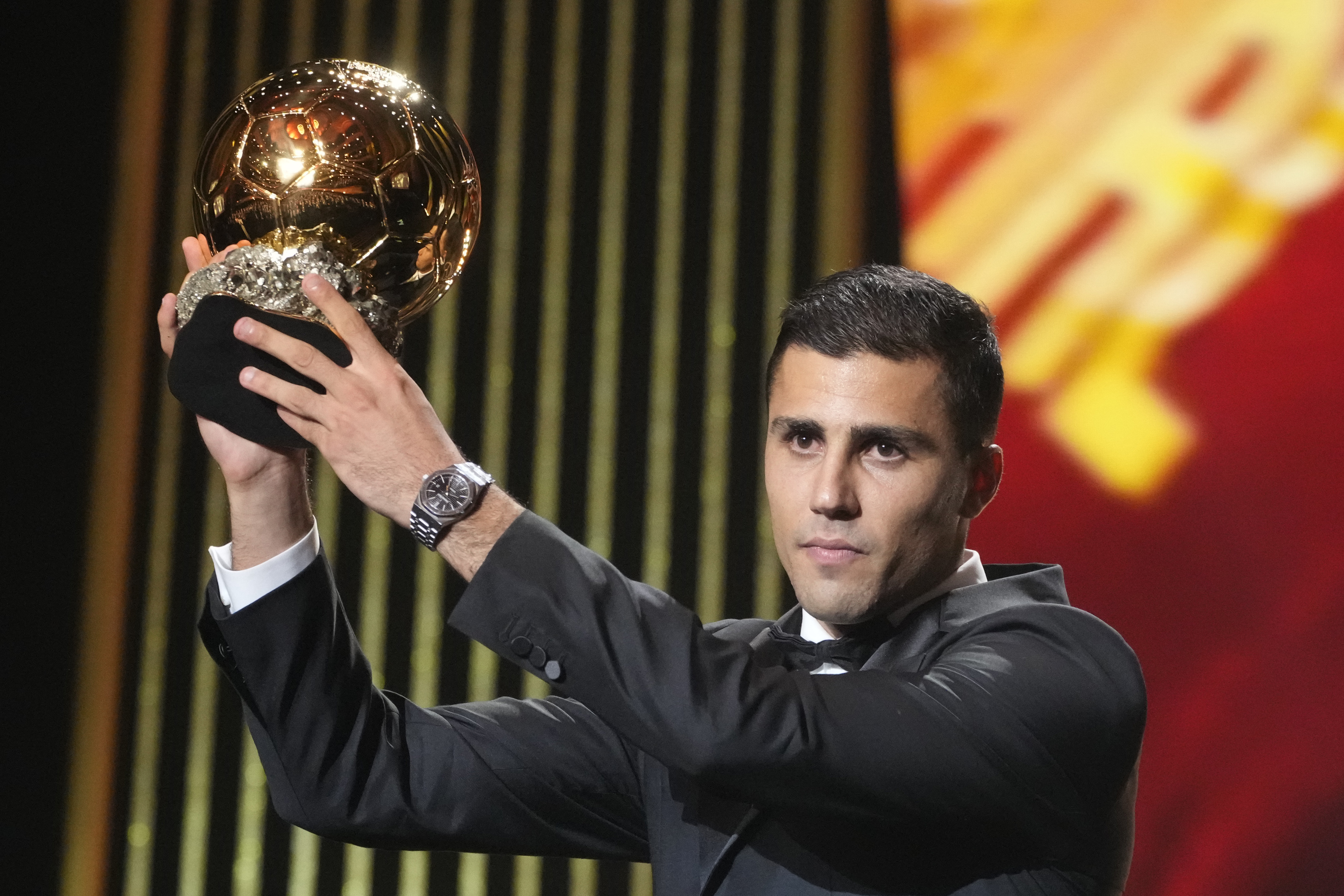 Manchester City's Spanish player Rodri receives the 2024 Men's Ballon d'Or award during the 68th Ballon d'Or (Golden Ball) award ceremony at Theatre du Chatelet in Paris, Monday, Oct. 28, 2024.