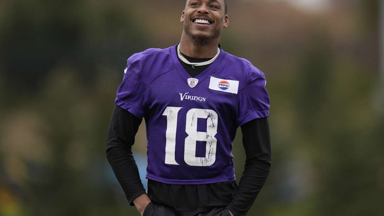 Minnesota Vikings wide receiver Justin Jefferson walks across the field during an NFL football team practice in Eagan, Minn., Friday, Nov. 22, 2024.