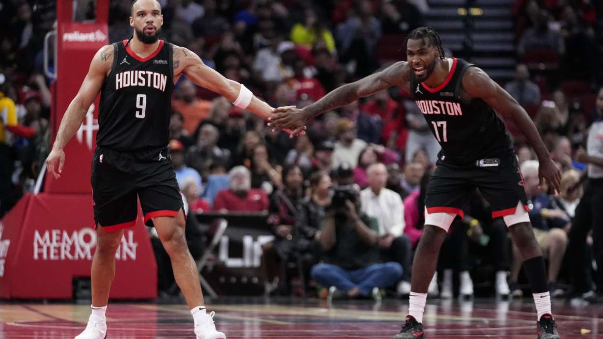 Houston Rockets forward Dillon Brooks (9) celebrates with forward Tari Eason (17) after making a 3-pointer during the second half of an Emirates NBA Cup basketball game against the Portland Trail Blazers in Houston, Friday, Nov. 22, 2024.