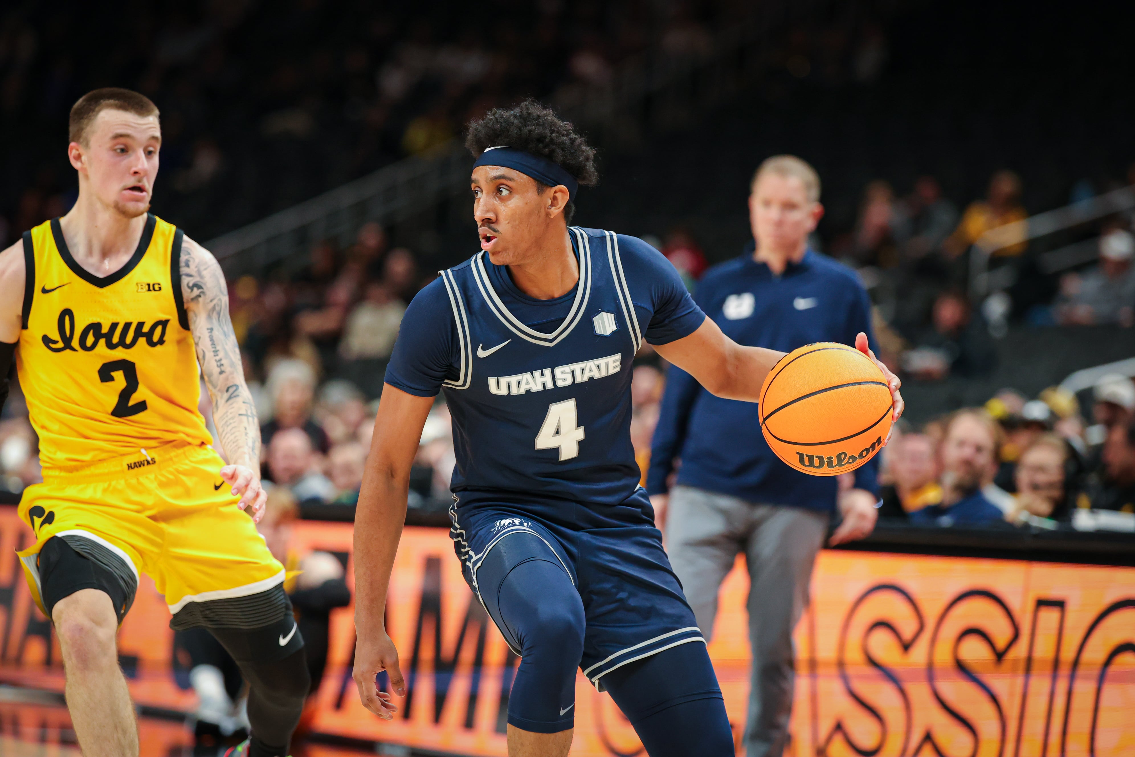 Utah State basketball stays undefeated with victory over Iowa