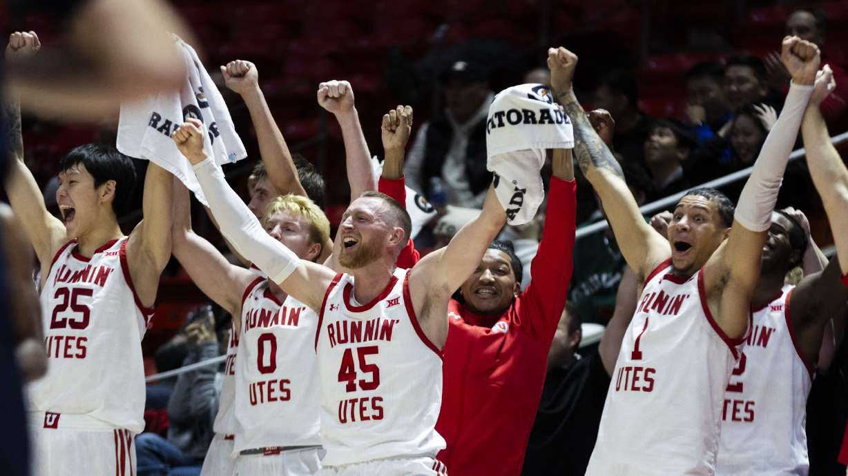 Utah Utes players celebrate from the bench after one of their teammates scored a basket during a game between the Utah Utes and the Utah Tech Trailblazers at the Huntsman Center on the campus of the University of Utah in Salt Lake City on Friday, Nov. 22, 2024.
