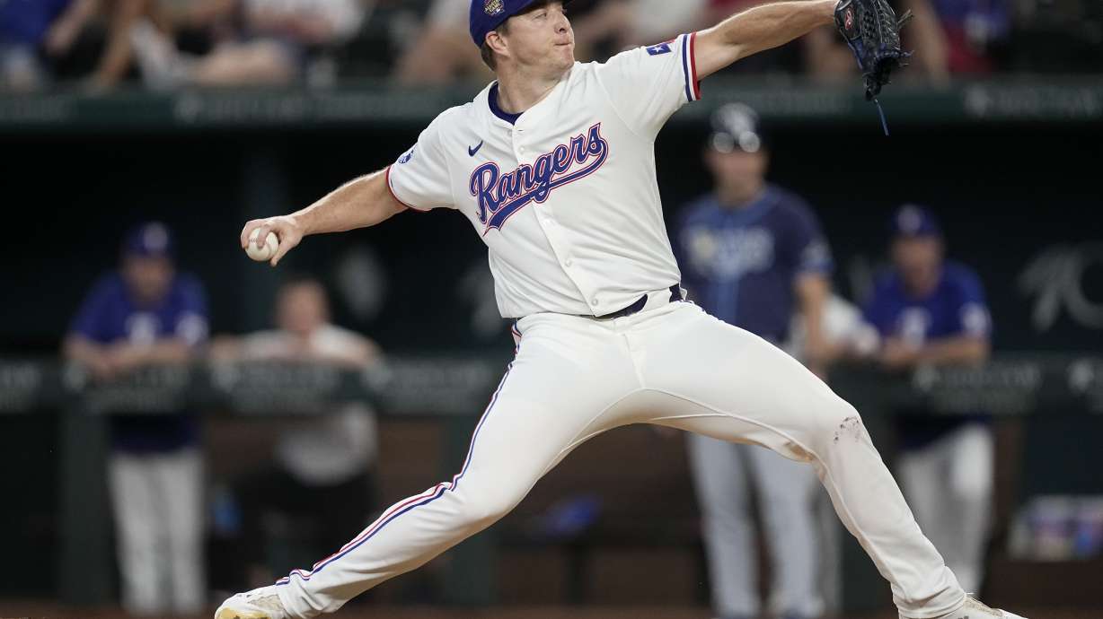 FILE - Texas Rangers relief pitcher Josh Sborz throws to the Tampa Bay Rays in the seventh inning of a baseball game in Arlington, Texas, July 6, 2024.