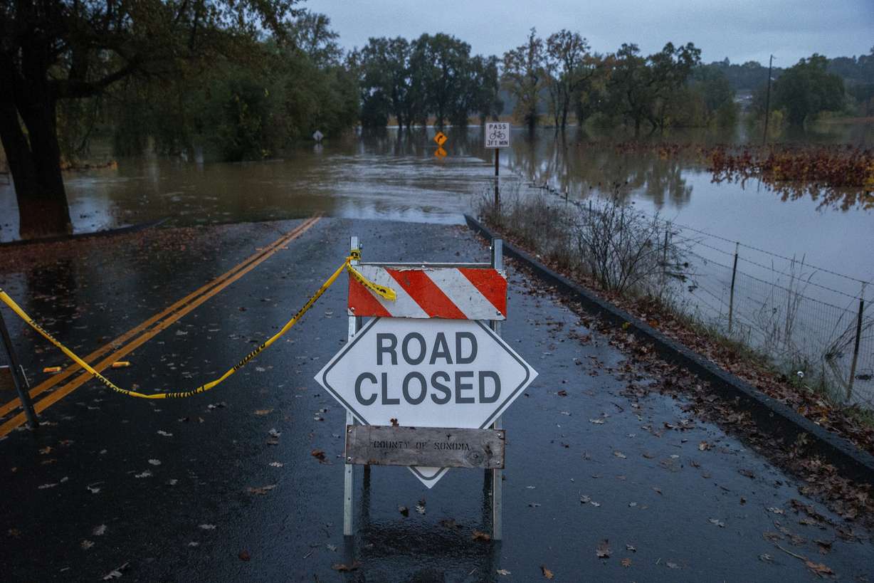 Wohler Road off River Road is closed off as the Russian River floods in Sonoma County, Calif., on Friday.