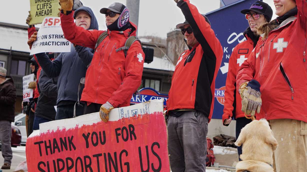Ski patrollers demonstrate Nov. 23 in Park City after union negotiations with Vail Resorts reach a standstill.
