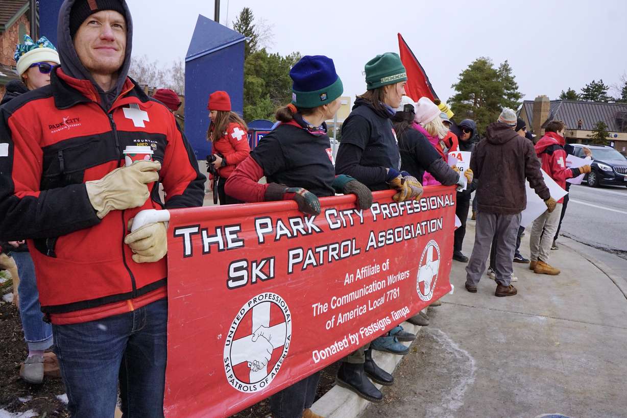 Ski patrollers demonstrate Saturday in Park City after union negotiations with Vail Resorts reaches a standstill.