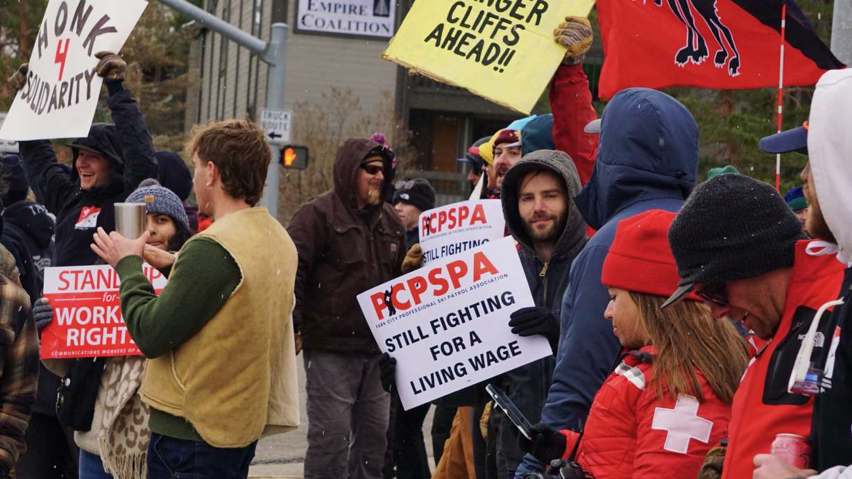 Ski patrollers demonstrate Nov. 23 in Park City after union negotiations with Vail Resorts reach a standstill. The Park City Ski Patrol Association announced Saturday that a strike authorization vote held this week passed unanimously.