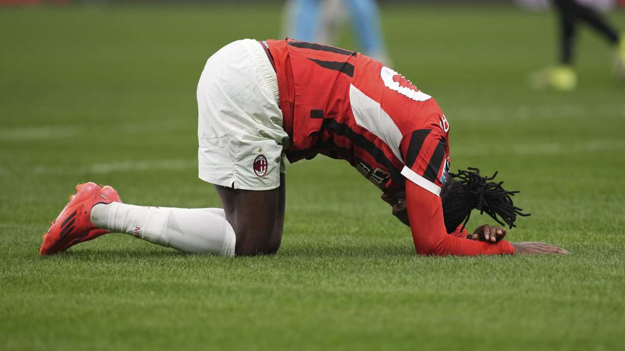 AC Milan's Rafael Leao crouches at the end of the Serie A soccer match between AC Milan and Juventus at the San Siro stadium in Milan, Italy, Saturday, Nov. 23, 2024.