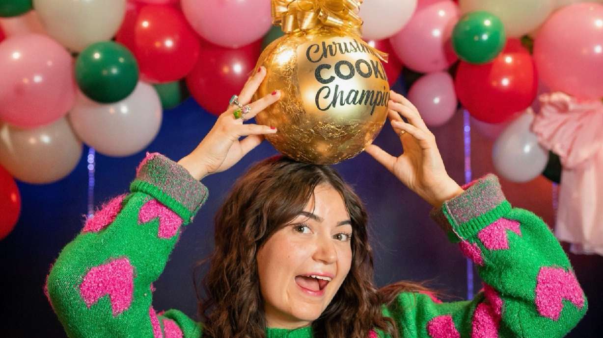 Anya Fazulyanov, 19, from Cedar Hills, poses with her trophy from the Food Network's Christmas Cookie Challenge. Fazulyanov is one of the youngest winners in the history of the show.
