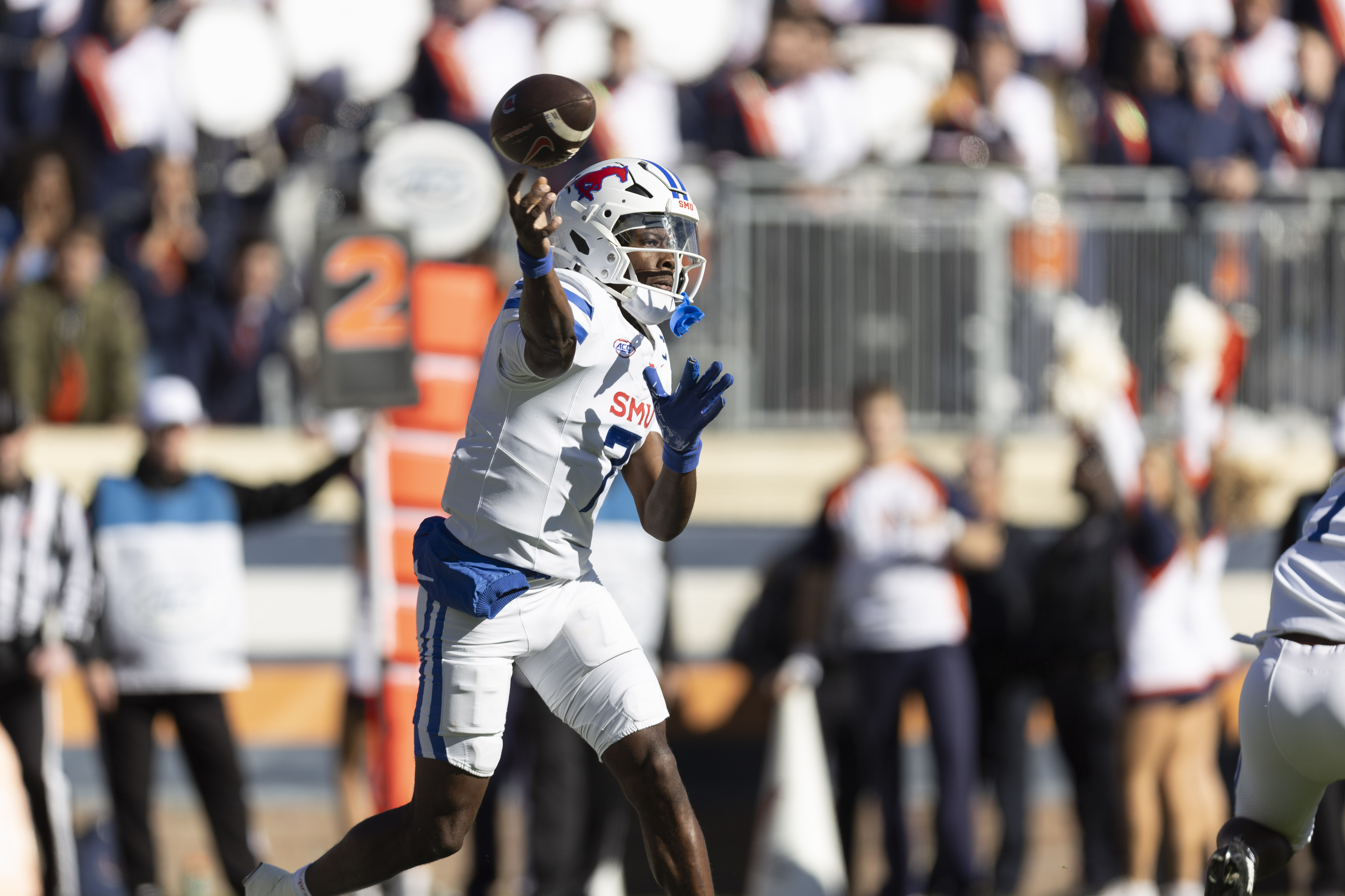 Southern Methodist quarterback Kevin Jennings (7) throws the ball during the first half of an NCAA college football game against Virginia, Saturday, Nov. 23, 2024, in Charlottesville, Va.