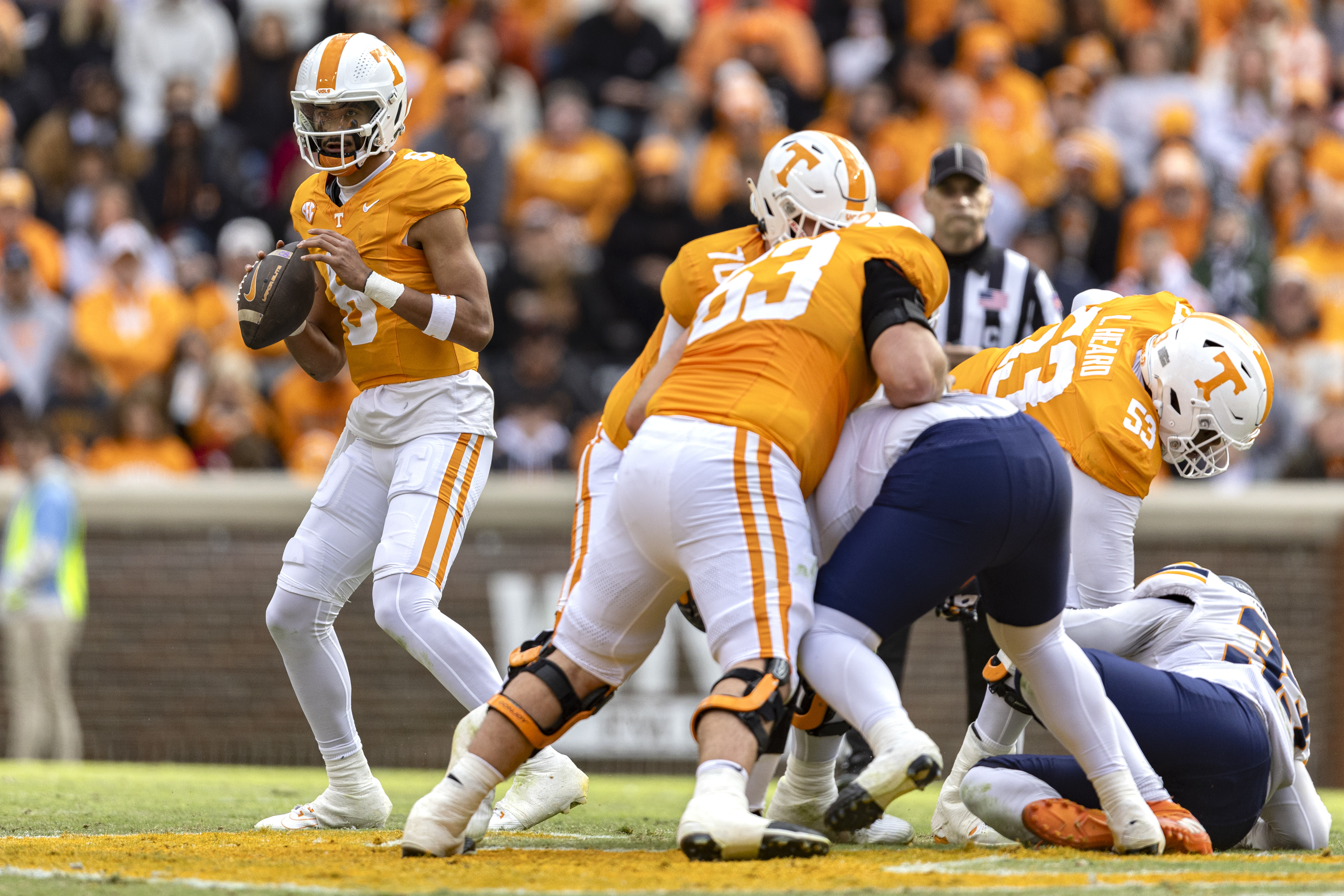 Tennessee quarterback Nico Iamaleava (8) looks for a receiver during the first half of an NCAA college football game against UTEP, Saturday, Nov. 23, 2024, in Knoxville, Tenn. 