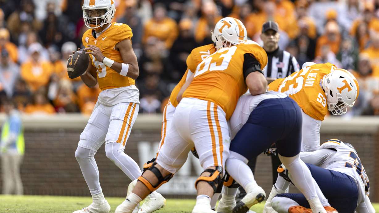 Tennessee quarterback Nico Iamaleava (8) looks for a receiver during the first half of an NCAA college football game against UTEP, Saturday, Nov. 23, 2024, in Knoxville, Tenn.
