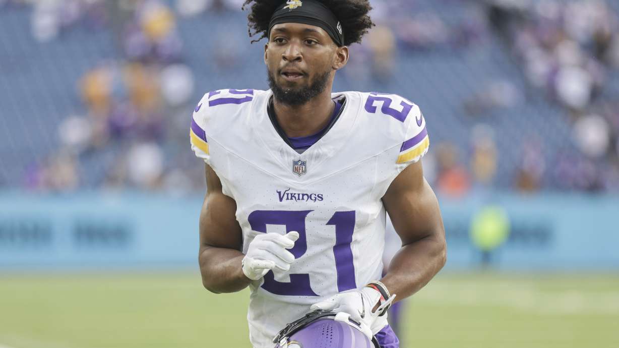 FILE - Minnesota Vikings cornerback Akayleb Evans (21) walks off the field following an NFL football game against the Tennessee Titans, Nov. 17, 2024, in Nashville, Tenn.