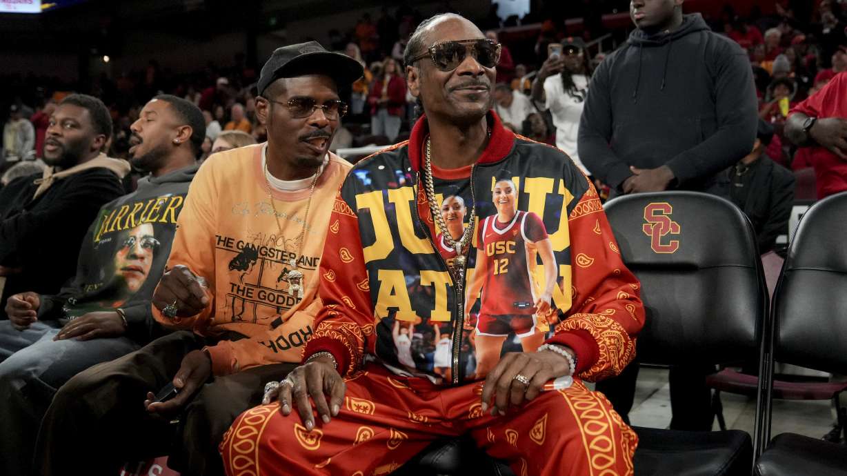 Snoop Dogg attends an NCAA college basketball game between Southern California and Notre Dame, Saturday, Nov. 23, 2024 in Los Angeles.