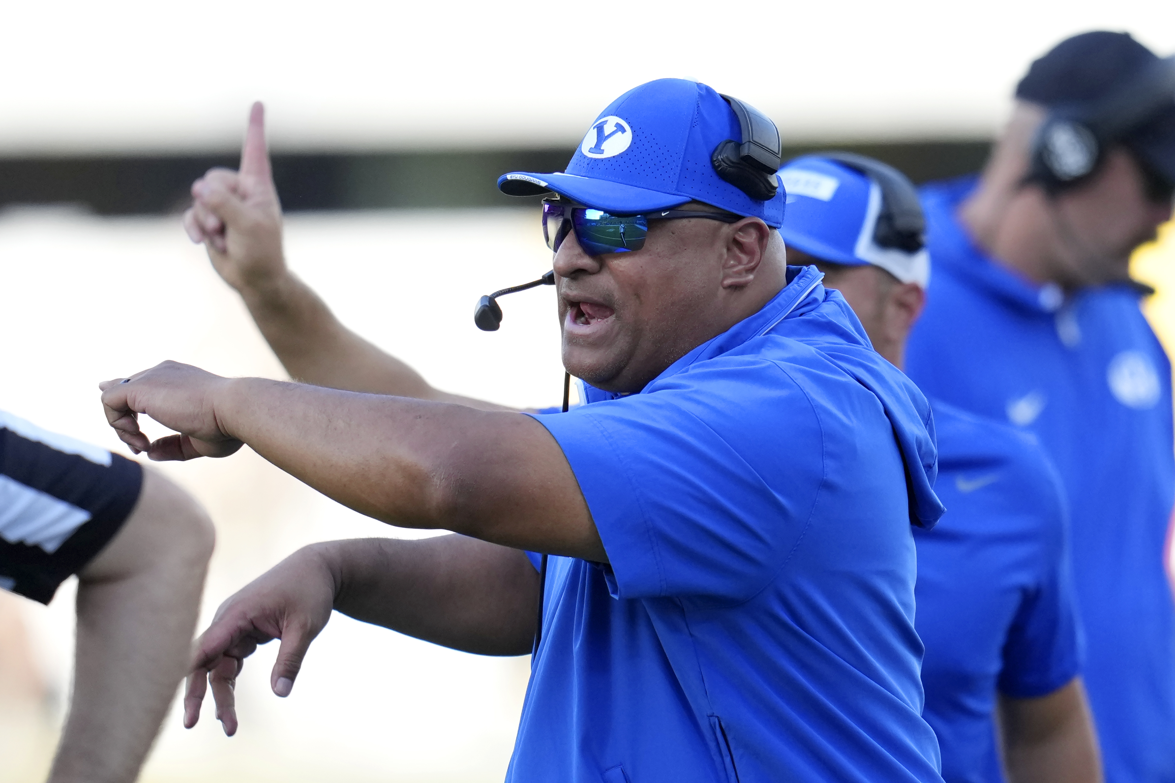 BYU head coach Kalani Sitake shouts instructions during the second half of an NCAA college football game against Arizona State Saturday, Nov. 23, 2024, in Tempe, Ariz. Arizona State won 28-23.