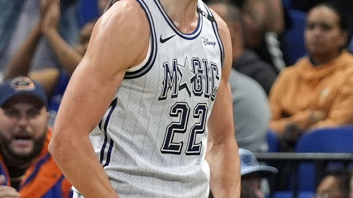 Orlando Magic forward Franz Wagner celebrates as fans cheer after he made a basket against the Detroit Pistons during the first half of an NBA basketball game, Saturday, Nov. 23, 2024, in Orlando, Fla.