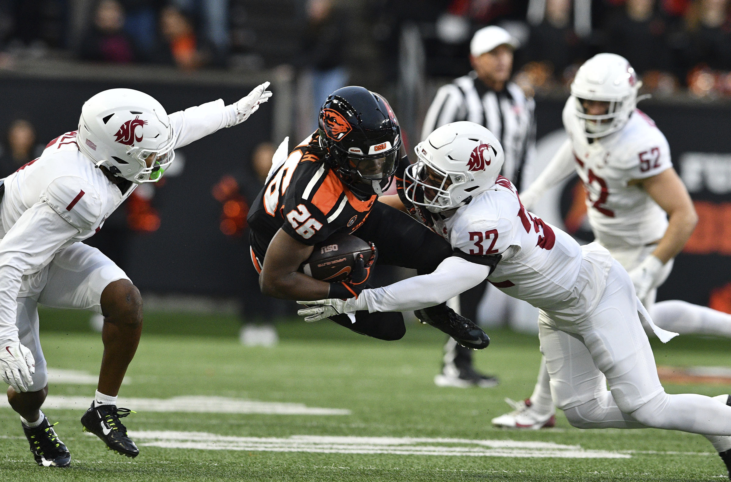 Oregon St. claims Pac-12 'title' and snaps a 5-game skid with 41-38 win over No. 25 Washington St.