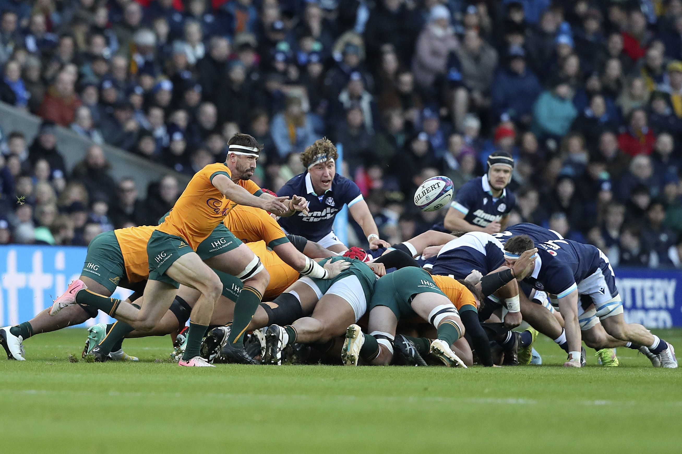 Australia's Jake Gordon, left, throws the ball after a scrum during the Autumn Nations series rugby union match between Scotland and Australia in Edinburgh, Sunday, Nov. 24, 2024.