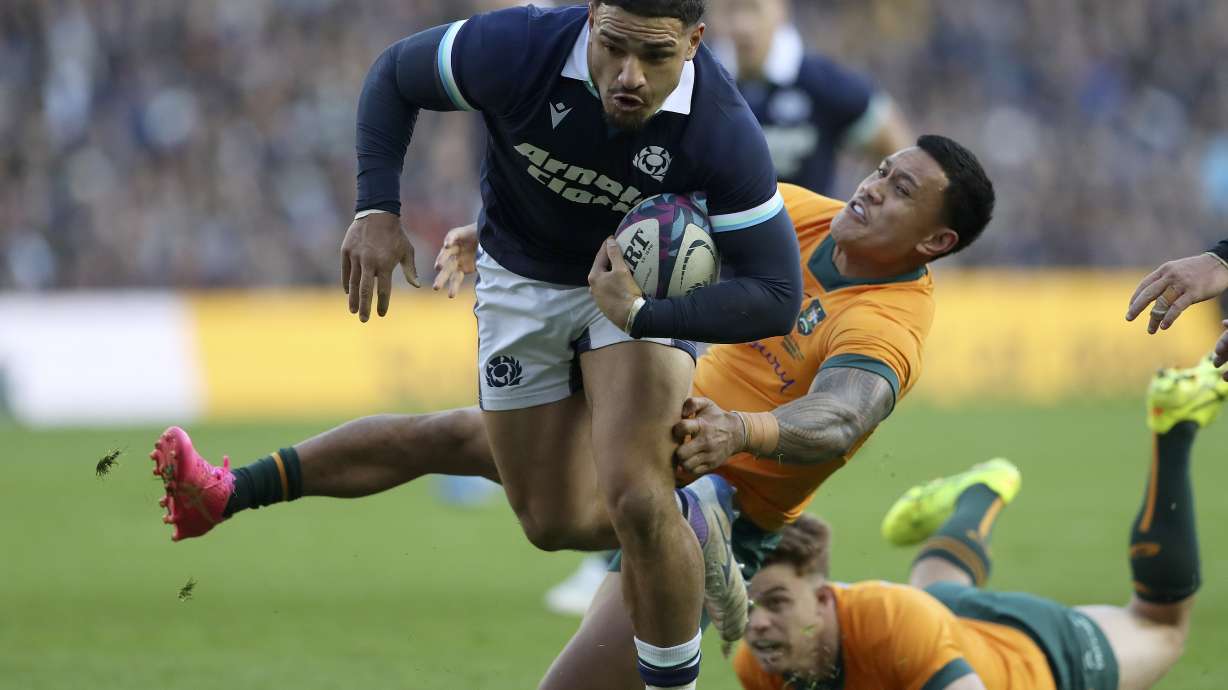 Scotland's Sione Tuipulotu runs to score a try during the Autumn Nations series rugby union match between Scotland and Australia in Edinburgh, Sunday, Nov. 24, 2024.