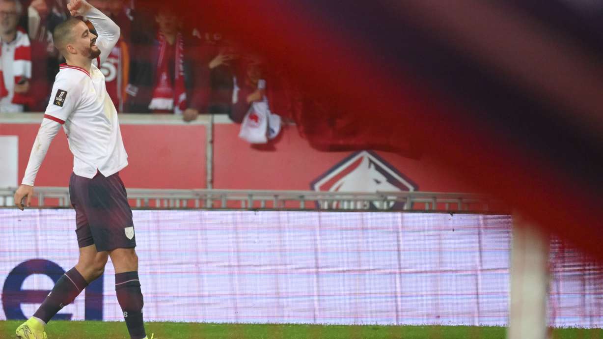Lille's Edon Zhegrova celebrates after scoring his side's first goal during the French League One soccer match between Lille and Rennes at the Stade Pierre Mauroy in Villeneuve-d'Ascq, outside Lille, northern France, Sunday, Nov. 24, 2024.