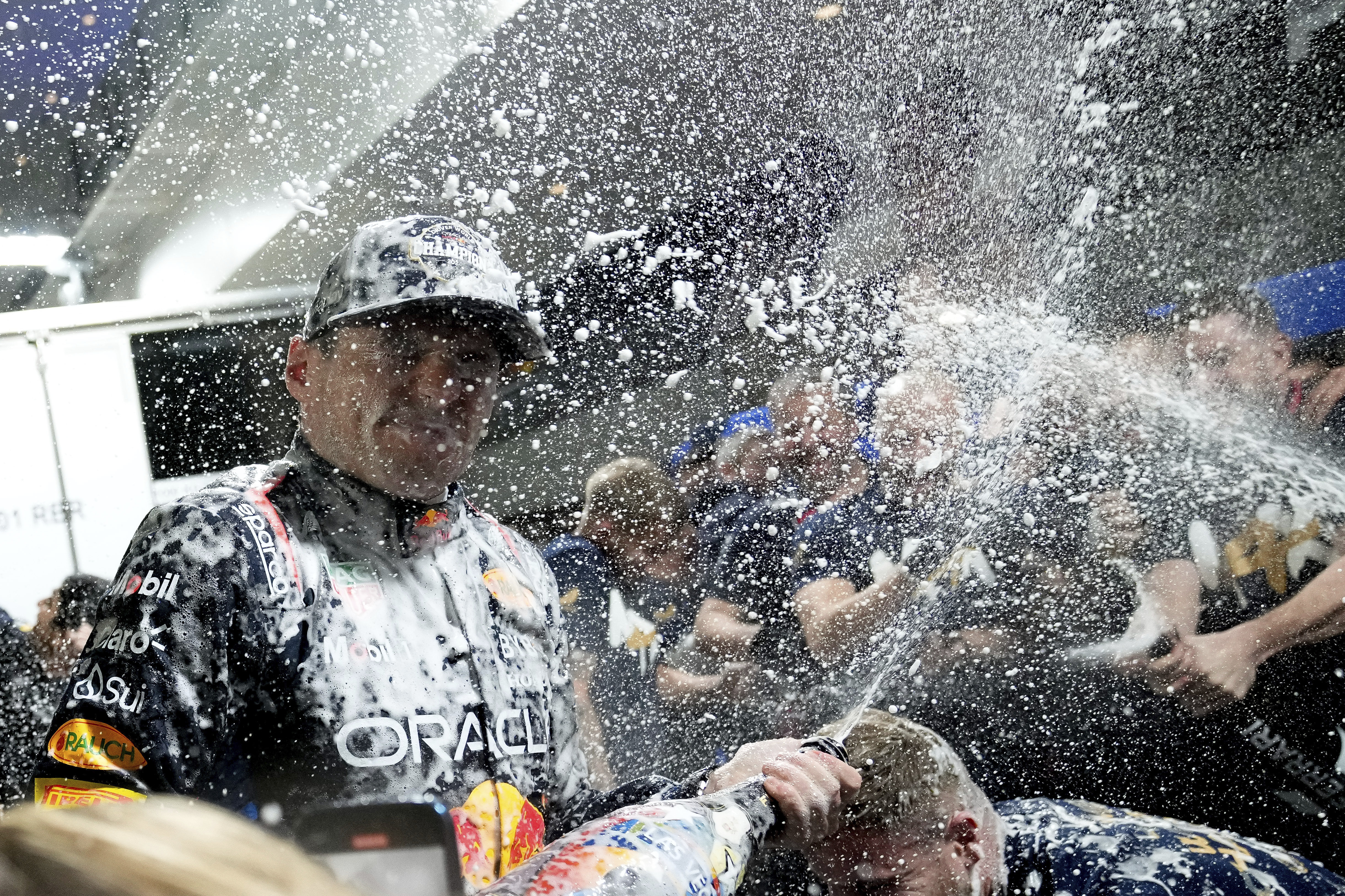 Red Bull driver Max Verstappen, of the Netherlands, celebrates winning the Formula 1 championship with his team after the F1 Las Vegas Grand Prix auto race, Sunday, Nov. 24, 2024, in Las Vegas.