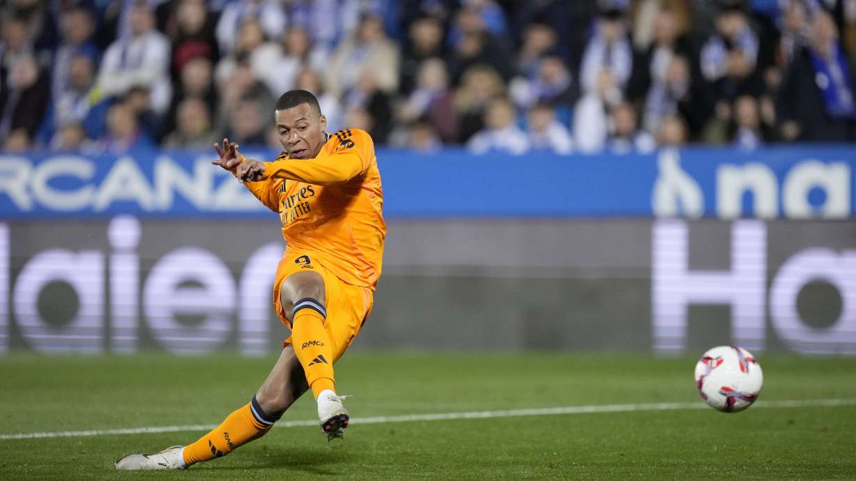 Real Madrid's Kylian Mbappe scores a goal disallowed for offside during a Spanish La Liga soccer match between CD Leganes and Real Madrid in Leganes, outside Madrid, Sunday, Nov. 24, 2024.