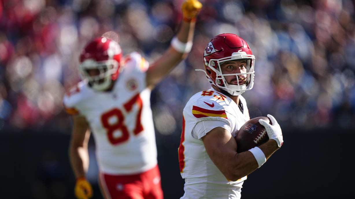 Kansas City Chiefs tight end Noah Gray (83) runs to the end zone for a touchdown against the Carolina Panthers during the first half of an NFL football game, Sunday, Nov. 24, 2024, in Charlotte, N.C.